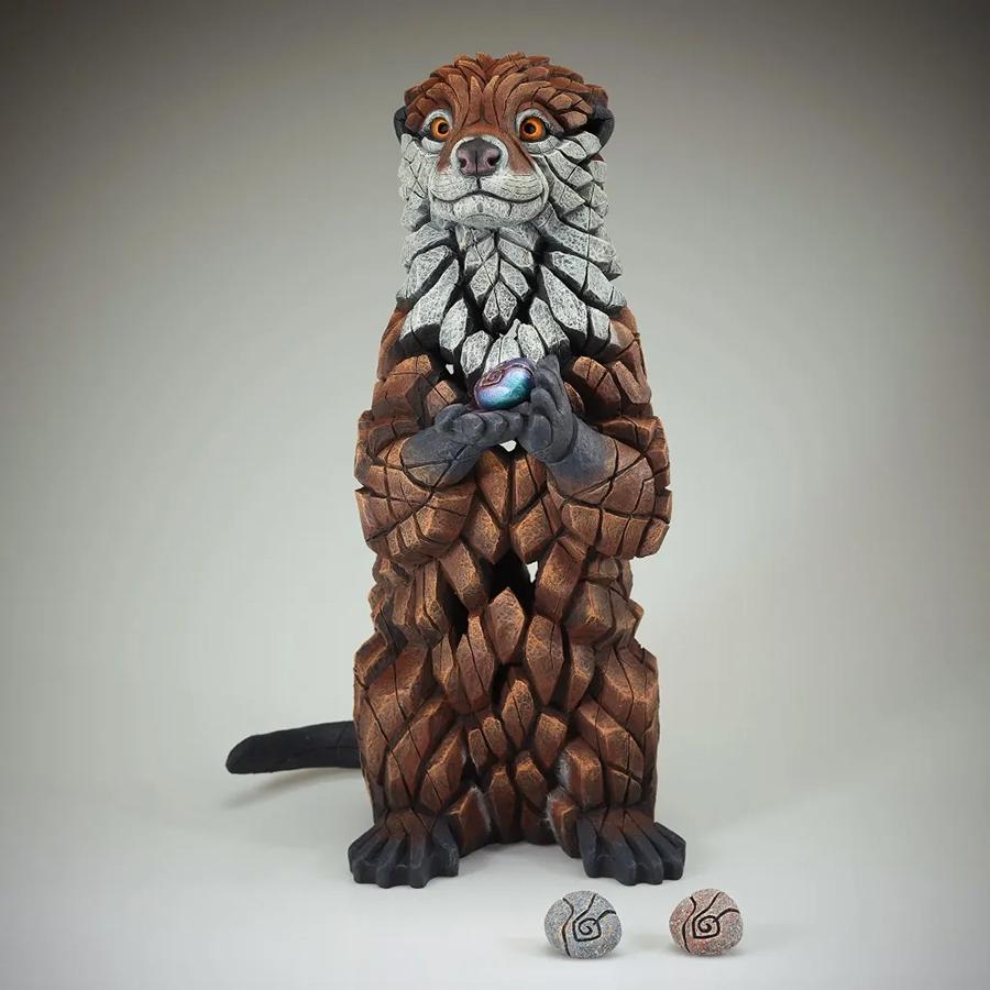 Otter Sculpture With Pebbles